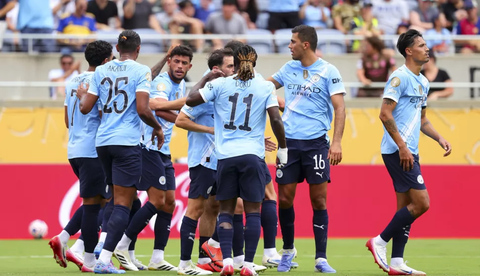 epa12199688 Manchester City players celebrate after scoring a goal during the FIFA Club World Cup 2025 match between Juventus and Manchester City in Orlando, Florida, USA, 26 June 2025. EPA/CRISTOBAL HERRERA-ULASHKEVICH