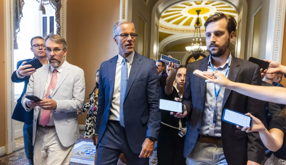 epa12208490 Republican Senate Majority Leader John Thune (C) speaks to reporters about the so-called 'Big, beautiful bill' in the US Capitol in Washington, DC, USA, 01 July 2025. Thune said he hopes to have a deal for the bill's passage in the Senate later in the day. According to the Congressional Budget Office, the bill will add nearly 3.3 trillion dollars to the US national deficit. EPA/JIM LO SCALZO