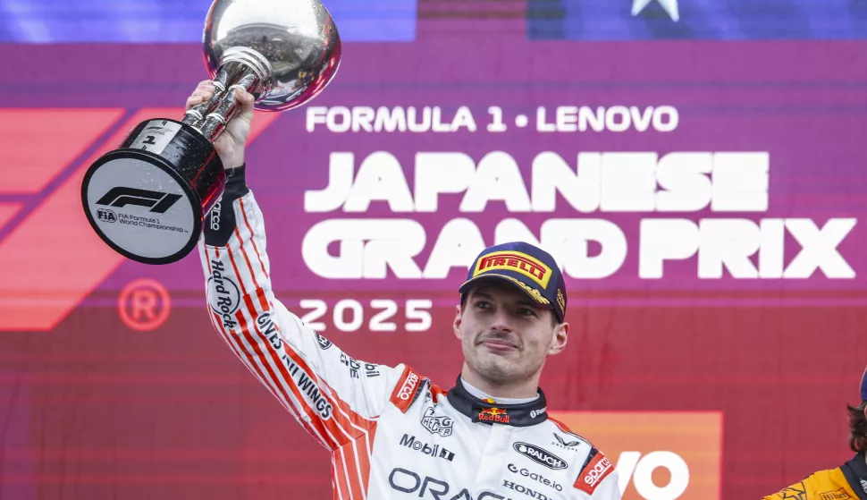 epa12013139 Red Bull Racing driver Max Verstappen of Netherlands celebrates on the podium after winning the 2025 Formula 1 Japanese Grand Prix at the Suzuka Circuit, Suzuka, Japan, 06 April 2025. EPA/FRANCK ROBICHON