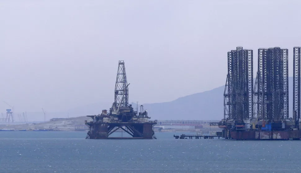 epa06945532 (FILE) - Oil platforms on the Caspian Sea in Baku, Azerbaijan, 28 June 2015 (reissued 12 August 2018). The leaders of five countries bordering the Caspian Sea - Caspian Five Russia, Iran, Kazakhstan, Azerbaijan and Turkmenistan - plan tosign the Convention of the legal status of the Caspian Sea at the Aktau summit on 12 August. It is expected to clarify the resources-rich Caspian Sea's status of whether being a lake or a sea, and ban non-littoral states from mliitary presence in the world's largest enclosed inland body of water. EPA/ROBERT GHEMENT *** Local Caption *** 52029286