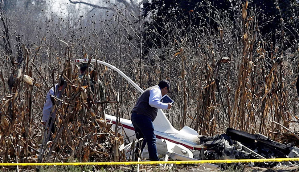 epa07249658 Experts from the Public Prosecutor's Office of the State of Puebla and Civil Aeronautics continue with the expertise in the area of the plane crash in which the governor of Puebla, Martha Erika Alonso, her husband Rafael Moreno Valle and three other people died, in Coronango, Mexico, 26 December 2018. Mexican Presindet Andres Manuel Lopez Obrador promised today not to hide 'absolutely nothing' in order to eliminate 'suspicions' towards his government in the plane crash. EPA/Hilda RA­os
