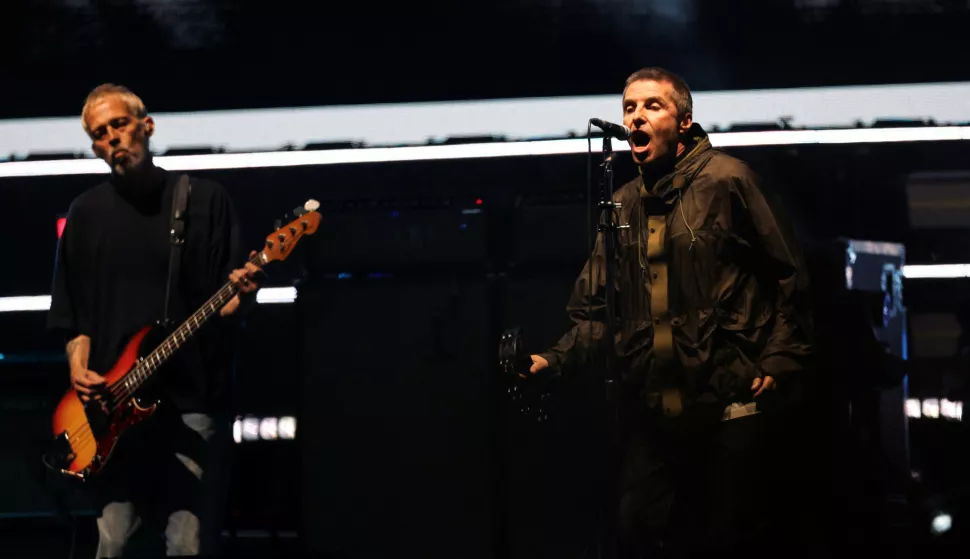 Liam Gallagher and Gem Archer of Oasis perform, during the first of their sellout comeback shows, at the Cardiff Principality Stadium, in Cardiff, Wales, Britain, July 4, 2025. REUTERS/Suzanne Plunkett NO RESALES. NO ARCHIVES. NO USE AFTER 365 DAYS AFTER PUBLICATION. PHOTOGRAPHS MAY BE PUBLISHED IN CONTEXT WITH THE SHOW ONLY. Photo: Suzanne Plunkett/REUTERS