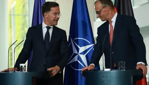 epa12227046 German Chancellor Friedrich Merz (R) and NATO Secretary-General Mark Rutte (L) attend a press conference at the Chancellery in Berlin, Germany, 09 July 2025. EPA/CLEMENS BILAN