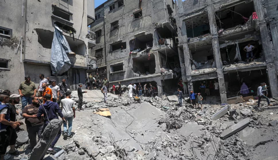 epa12161929 Palestinians search for bodies and survivors among the rubble of a destroyed house following an Israeli airstrike on Al Sabra neighborhood in Gaza City, the Gaza Strip, 07 June 2025. According to the Palestinian Civil Defense in Gaza, at least 15 people were killed and several others were injured after the strike. More than 54,600 Palestinians have been killed in the Gaza Strip, according to the Palestinian Ministry of Health, since Israel launched a military campaign in the strip in response to a cross-border attack led by the Palestinian militant group Hamas on 07 October 2023, in which about 1,200 Israelis were killed and more than 250 taken hostage. EPA/MOHAMMED SABER