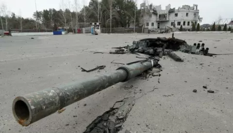 epaselect epa09886381 A part of a destroyed Russian tank in a road in Bohdanivka village, Kyiv area, Ukraine, 12 April 2022. Some cities and villages have recently been recaptured by the Ukrainian army from Russian forces withdrawing, and now people try to restore normal life there. On 24 February Russian troops had entered Ukrainian territory resulting in fighting and destruction in the country, a huge flow of refugees, and multiple sanctions against Russia. EPA/SERGEY DOLZHENKO