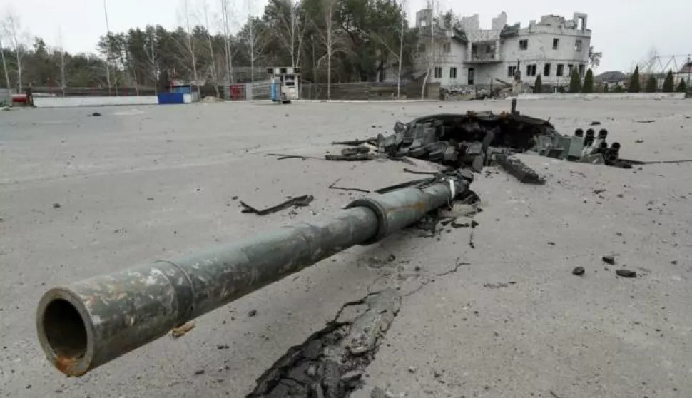 epaselect epa09886381 A part of a destroyed Russian tank in a road in Bohdanivka village, Kyiv area, Ukraine, 12 April 2022. Some cities and villages have recently been recaptured by the Ukrainian army from Russian forces withdrawing, and now people try to restore normal life there. On 24 February Russian troops had entered Ukrainian territory resulting in fighting and destruction in the country, a huge flow of refugees, and multiple sanctions against Russia. EPA/SERGEY DOLZHENKO