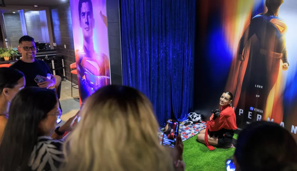 epa12228168 Venezuelan actor Maria Gabriela de Faria holds a dog after the Superman movie preview in Miami, Florida, USA, 09 July 2025. Faria plays the character of The Engineer in the Superman movie. EPA/CRISTOBAL HERRERA-ULASHKEVICH