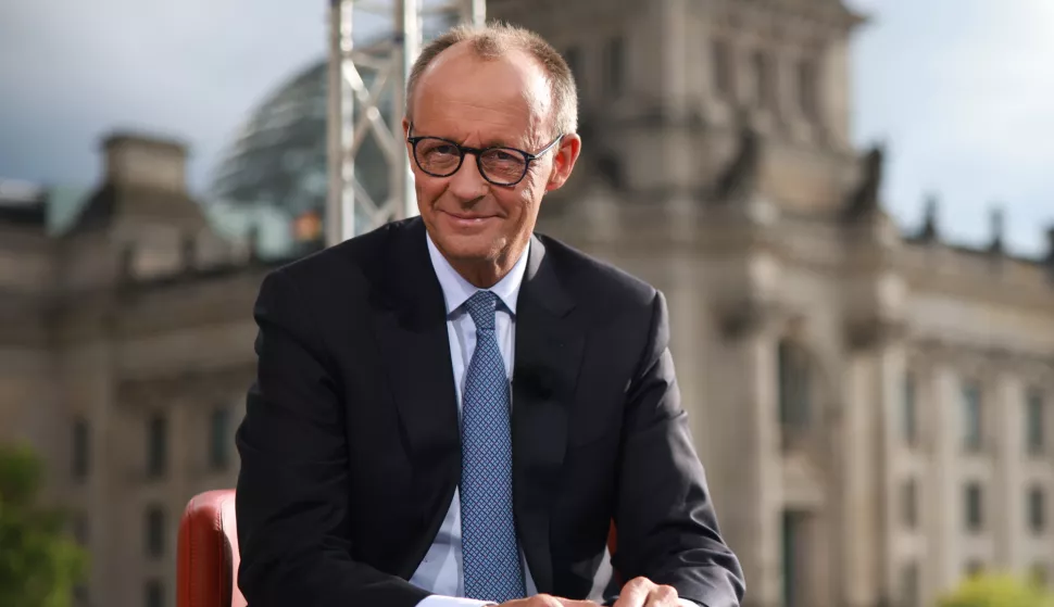 epa12235961 German Chancellor Friedrich Merz poses after the summer interview with public broadcaster ARD in Berlin, Germany, 13 July 2025. EPA/CLEMENS BILAN