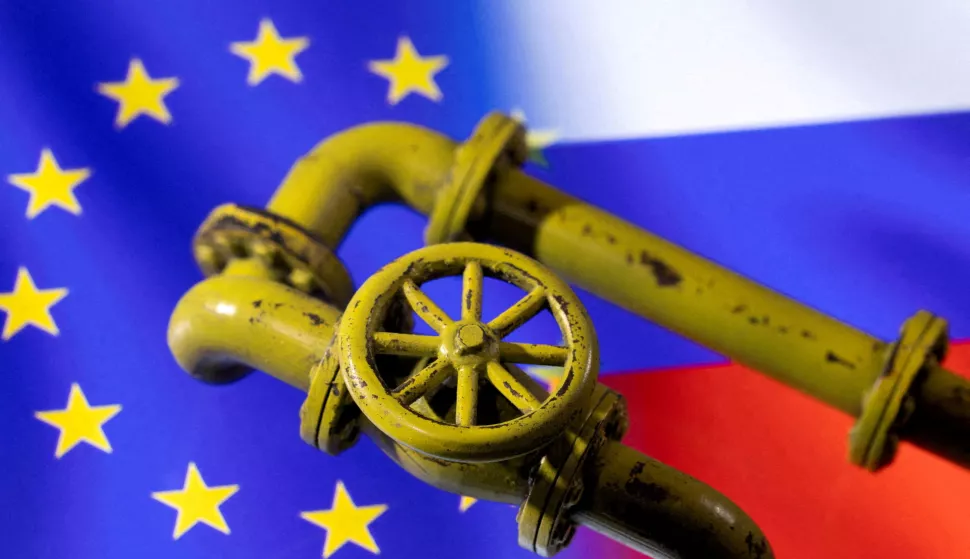 FILE PHOTO: A 3D printed Natural Gas Pipes are placed on displayed EU and Russian flags in this illustration taken, January 31, 2022. REUTERS/Dado Ruvic/File Photo