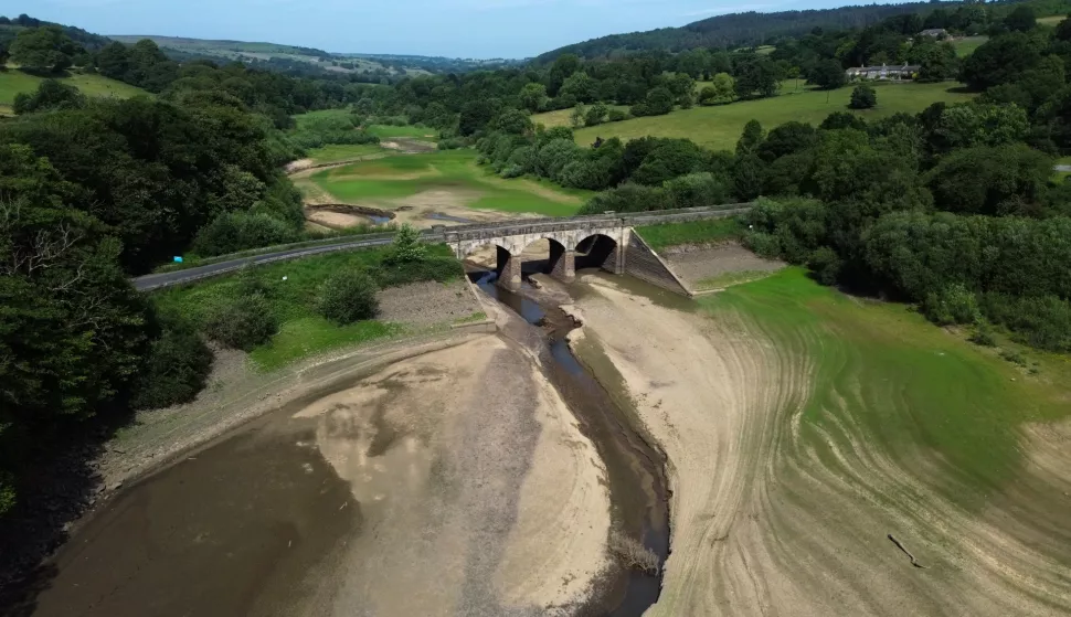 epa12187119 An aerial photograph taken with a drone shows low water levels exposing the dried reservoir bed of Lindley Wood Reservoir, Britain, 20 June 2025. On 12 June Yorkshire became the second region in England to move into drought status following the driest spring in 132 years, according to the Environment Agency. EPA/ADAM VAUGHAN