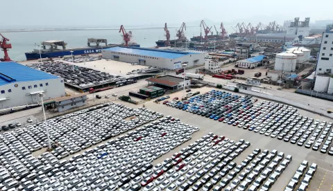 epa12235901 This aerial photo taken on July 13, 2025 shows motor vehicles waiting to be exported at a port in Lianyungang City, east China's Jiangsu Province. China's maritime industry now handles nearly one-third of global maritime shipping volume, according to the 2025 China Maritime Day Forum held in the coastal town of Boao in south China's Hainan Province on Friday. China's booming marine economy is driving sustained and stable growth in global trade and development. EPA/XINHUA/Wang Chun CHINA OUT/UK AND IRELAND OUT/  MANDATORY CREDIT EDITORIAL USE ONLY