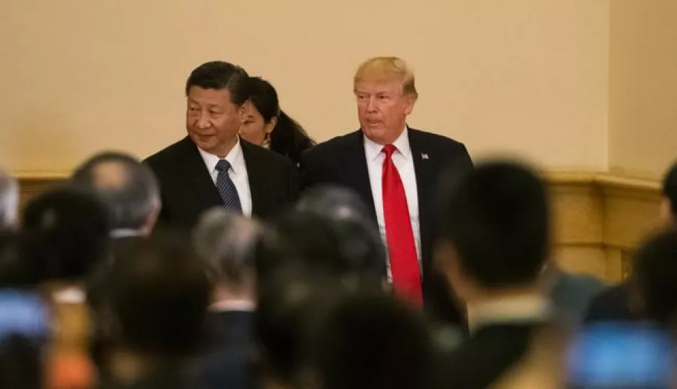 epa06317049 US President Donald J. Trump (R) and Chinese President Xi Jinping (L) arrive for a press conference at the Great Hall of the People (GHOP) in Beijing, China, 09 November 2017. Trump is on an official visit to China from 08 to 10 November as part of his 12-day tour of Asia. EPA/ROMAN PILIPEY