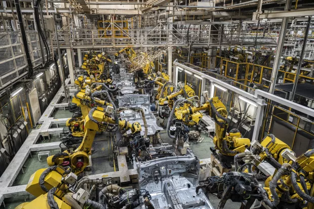 epa11137272 An overall view of the welding line at the factory of Magyar Suzuki Zrt., the Hungarian affiliate of the Japanese company Suzuki Motor Corp., in Esztergom, Hungary, 08 February 2024, as workers celebrated the four millionth car manufactured in the plant. EPA/Zsolt Szigetvary HUNGARY OUT