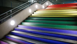 epa12258041 Stairs of the U5 underground station 'Bundestag' are decorated in rainbow colors in Berlin, Germany, 24 July 2025. The Berlin public transportation company BVG has adorned the entrance of the underground station with an LGBTQ+ flag and painted the stairs inside the station in rainbow colors on the occasion of the upcoming Christopher Street Day&nbsp;(CSD). An earlier decision of Bundestag President Julia Kloeckner not to fly the rainbow flag during the CSD celebrations over the Bundestag, the seat of the German parliament,&nbsp;drew criticism. EPA/CLEMENS BILAN