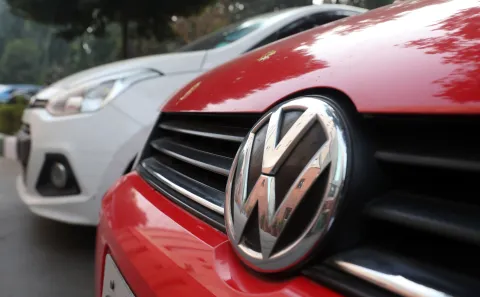 epa07292472 The logo of German company Volkswagen seen on a car in New Delhi, India, 17 January 2019. Indian Green Panel, also known as&nbsp;National Green Tribunal,&nbsp;issued a fine of approximately 14 million US dollar after Volkswagen's on-road emissions were 1.1 times to 2.6 timeshigher than pollution norms in India. The&nbsp;National Green Tribunal gave the company 24 hours to pay the fine. EPA/HARISH TYAGI
