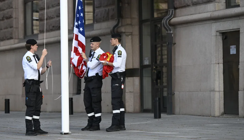 epa12267717 The US and Chinese flag are being raised outside of Sweden's government offices, 'Rosenbad,' ahead of the trade talks between China and the USA, in Stockholm, Sweden, 28 July 2025. EPA/FREDRIK SANDBERG SWEDEN OUT