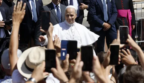 epa12248926 Pope Leo XIV gestures to the faithful as he presides over a holy mass in the Cathedral of St. Pancras in Albano near Rome, Italy, 20 July 2025. EPA/FABIO FRUSTACI