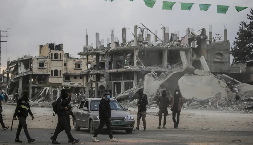 epa11845042 Hamas security men patrol the streets as humanitarian aid trucks cross into Rafah amid a ceasefire between Israel and Hamas, in the east of Rafah, southern Gaza Strip, 22 January 2025. According to the UN, hundreds of humanitarian aid trucks have entered the Gaza Strip since Israel and Hamas implemented the first phase of a hostage release and ceasefire deal on 19 January 2025. EPA/MOHAMMED SABER