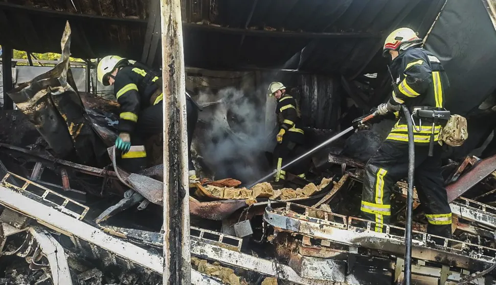 epa12283877 A handout photo made available by the State Emergency Service of Ukraine (SES) shows rescuers working at the site of a damaged building after Russian strikes, in Lozova, Kharkiv region, Ukraine, 05 August 2025, amid the Russian invasion. At least one person was killed and 10 others injured after Russian drone strikes hit Lozova overnight, the State Emergency Service of Ukraine said. EPA/STATE EMERGENCY SERVICE OF UKRAINE HANDOUT -- BEST QUALITY AVAILABLE -- MANDATORY CREDIT: STATE EMERGENCY SERVICE OF UKRAINE -- HANDOUT EDITORIAL USE ONLY/NO SALES