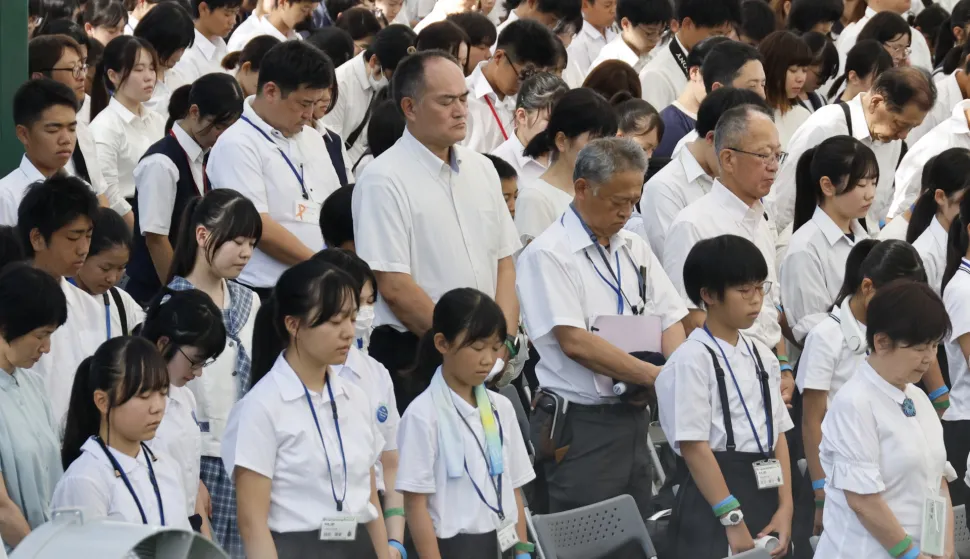 epa12285408 Attendees observe a moment of silence during the Peace Memorial Ceremony on the 80th anniversary of the atomic bombing of Hiroshima at Peace Memorial Park in Hiroshima, Japan, 06 August 2025. In 1945, the United States dropped two nuclear bombs over the cities of Hiroshima and Nagasaki on 06 and 09 August respectively, killing more than 200,000 people. EPA/FRANCK ROBICHON