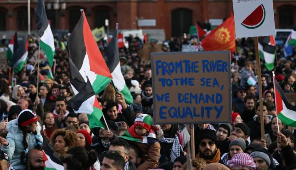 epa10957589 A protester holds a placard reading 'From the river to the sea, we demand equality', during a protest in solidarity with Palestinians, in Berlin, Germany, 04 November 2023. The rally in the inner city of Berlin was held under the motto 'Free Palestine will not be cancelled!'. Thousands of Israelis and Palestinians have died since the militant group Hamas launched an unprecedented attack on Israel from the Gaza Strip on 07 October, and the Israeli strikes on the Palestinian enclave which followed it. EPA/CLEMENS BILAN