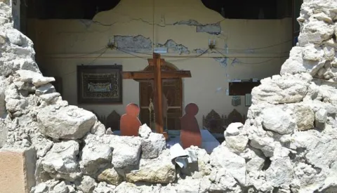 epa06101145 A damaged church is seen is seen following an earthquake on the island of Kos, Greece, 21 July 2017. Two earthquake-related fatalities were reported on the island of Kos in the early morning hours of 21 July, while several others were injured from a strong 6.7 magnitude earthquake that shook the island and much of the southeast Aegean region and southwestern Turkey. A 39-year-old Turk and a 27-year-old Swede are reportedly dead, according to sources. Five persons who have been seriously injured were transferred to the Heraklion University Hospital in Crete. Some buildings have suffered serious damage. The island's port has sustained damage while the airport is operating normally. EPA/GIANNIS KIARIS