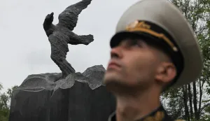 RUSSIA-ST. PETERSBURG-KURSH SUBMARINE ACCIDENT-COMMEMORATION(140812) -- ST. PETERSBURG, Aug. 12, 2014 (Xinhua) -- A soldier attends a ceremony in memory of soldiers who died in the Kursk submarine disaster, at the Serafimovskoe cemetery in St. Petersburg, Russia on Aug. 12, 2014. Russians commemorated on Tuesday the 118 soldiers who died in the Kursk submarine accident on Aug. 12, 2000. (Xinhua)xinhua Photo: XinHua/PIXSELL