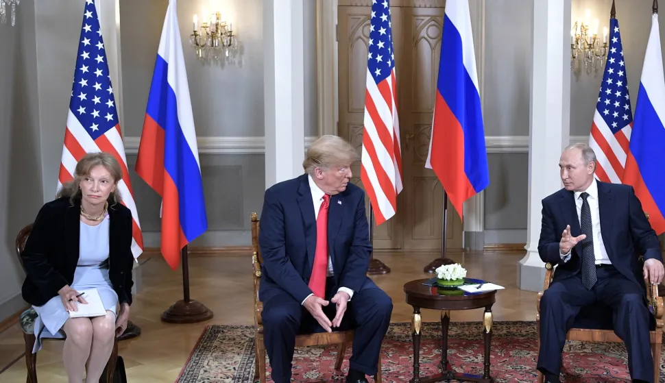 epa06897993 (FILE) - Russian President Vladimir Putin (R) and US President Donald J. Trump (C) during their meeting at the Presidential Palace in Helsinki, Finland, 16 July 2018 (reissued 19 Jul 2018). In picture at left is seen US interpreter Marina Gross. According to media reports, US opposition politicians are calling for Trump's interpreter Marina Gross to be subpoenaed before Congress amid growing concerns on the controversial two-hour closed-door summit talks between Trump and Putin, in which only the two leaders' translators were present. EPA/ALEXEY NIKOLSKY/SPUTNIK/KREMLIN/POOL MANDATORY CREDIT