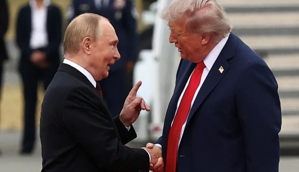 U.S. President Donald Trump shakes hand with Russian President Vladimir Putin, as they meet to negotiate for an end to the war in Ukraine, at Joint Base Elmendorf-Richardson in Anchorage, Alaska, U.S., August 15, 2025. REUTERS/Kevin Lamarque Photo: KEVIN LAMARQUE/REUTERS