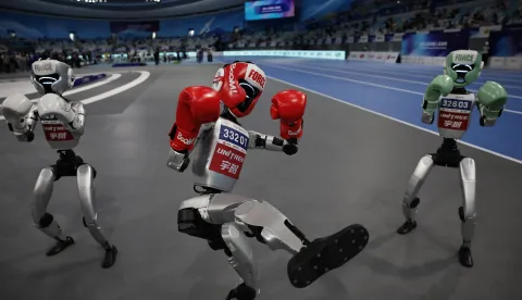 epaselect epa12306274 Humanoid robots show their skills after the Free fight Final match during the 2025 World Humanoid Robot Games in the National Speed Skating Oval in Beijing, China, 17 August 2025. The 2025 World Humanoid Robot Games were held in Beijing from 15 to 17 August. EPA/ANDRES MARTINEZ CASARES