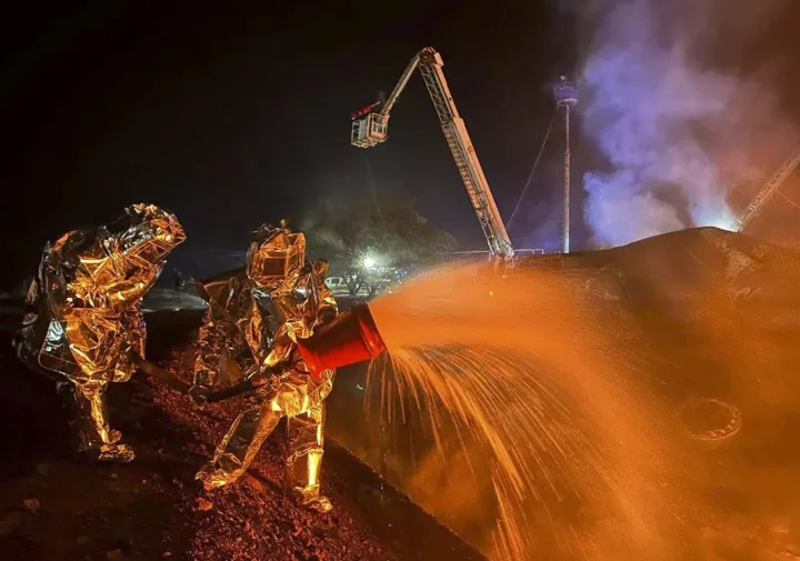 epa12311822 A handout photo provided by the State Emergency Service shows Ukrainian rescuers working at the site of a Russian strike on an infrastructure facility near Odesa, Ukraine, 18 August 2025 (issued 20 August 2025), amid the ongoing Russian invasion. At least one person was injured in a large fire at a fuel and energy infrastructure site, according to the State Emergency Service. EPA/STATE EMERGENCY SERVICE HANDOUT HANDOUT HANDOUT EDITORIAL USE ONLY/NO SALES