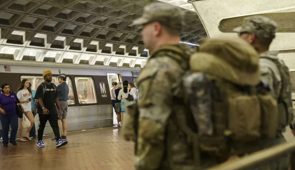 epa12313484 Members of the National Guard patrol inside Metro Center Station in Washington DC, USA, 20 August 2025. As President Trump's takeover of Washington, DC, policing enters its second week, Mississippi joins three other Republican-led states that have vowed to deploy National Guard members in support of the Trump administration's operation. EPA/WILL OLIVER