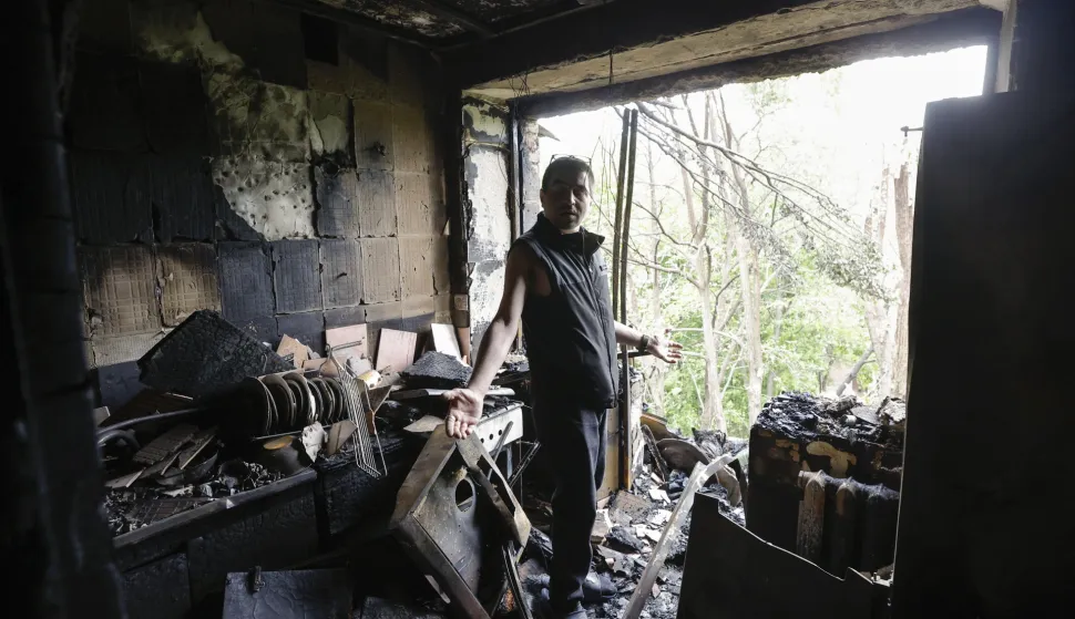 epa12129849 A resident inside his damaged flat in a five-storey residential building struck by a drone in Kyiv, Ukraine, 24 May 2025, amid the ongoing Russian invasion. Nobody was killed, but at least 15 people were injured in overnight strikes on multiple residential areas of Kyiv, according to the State Emergency Service. Russia launched a large-scale attack using at least 14 ballistic missiles and 250 drones across Ukraine. EPA/SERGEY DOLZHENKO