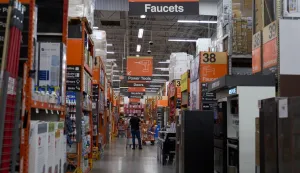 epa12311200 People shop at a Home Depot store in Los Angeles, California, USA, 19 August 2025. Home Depot reported net earnings at .6 billion slightly below expectations of .71 billion, with second quarter revenue also slightly down from projections. The company reported .2 billion in net sales, down from an expected .3 billion. CFO Richard McPhail warned that higher tariff rates for 'some imported goods' could impact prices. EPA/ALLISON DINNER
