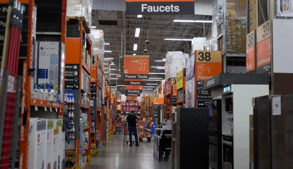 epa12311200 People shop at a Home Depot store in Los Angeles, California, USA, 19 August 2025. Home Depot reported net earnings at $4.6 billion slightly below expectations of $4.71 billion, with second quarter revenue also slightly down from projections. The company reported $45.2 billion in net sales, down from an expected $45.3 billion. CFO Richard McPhail warned that higher tariff rates for 'some imported goods' could impact prices. EPA/ALLISON DINNER