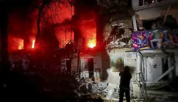 epa12335634 A handout photo released by the press service of the State Emergency Service (SES) of Ukraine shows Ukrainian rescuers working at the site of a Russian strike on a residential area in Zaporizhzhia, southeastern Ukraine, 30 August 2025, amid the Russian invasion. At least one person was killed and 22 others were injured, including three children, after Russian forces launched an overnight attack on Zaporizhzhia and surrounding areas, SES said. According to Ukrainian authorities, a large-scale attack across Ukraine was launched with around 540 drones, 8 ballistic missiles, and 37 other types of missiles. EPA/STATE EMERGENCY SERVICE OF UKRAINE HANDOUT -- BEST QUALITY AVAILABLE -- MANDATORY CREDIT: STATE EMERGENCY SERVICE OF UKRAINE -- HANDOUT EDITORIAL USE ONLY/NO SALES