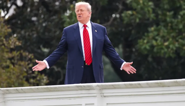 epa12284469 US President Donald J. Trump responds to a question from the news media as he tours the roof at the White House in Washington, DC, USA, 05 August 2025. President Trump has announced the construction of a new ballroom addition of approximately 90,000 total square feet of ornately designed and carefully crafted space, with a seated capacity of 650 people. EPA/SAMUEL CORUM/POOL