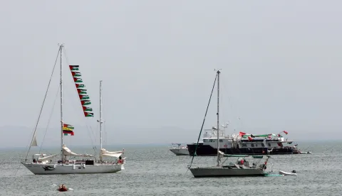 epa12364871 Vessels, part of the Global Sumud Flotilla, off the coast of Sidi Bou Said, one day after a drone attack on one of the humanitarian ships in Tunisian waters off Tunis, Tunisia, 09 September 2025. The Global Sumud Flotilla (GSF) for Gaza announced on 09 September that one of its main vessels was reportedly targeted by a drone while in Tunisian waters. The six people on board, both passengers and crew, were not injured. According to the WFTU statement, the ship, which sails under the Portuguese flag and carries the initiative's steering committee, suffered damage following a fire affecting the main deck and a storage area. Tunisian authorities rejected the theory of an airstrike, saying that, according to a first inspection, the explosion that caused the fire probably started inside the ship. EPA/MOHAMED MESSARA
