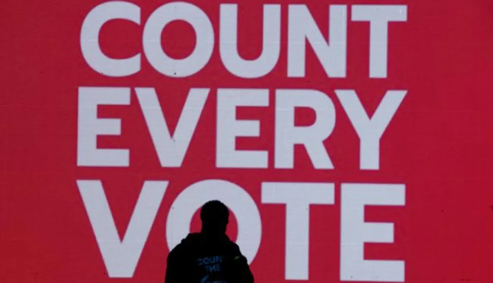 epaselect epa08799520 A singer performs in front of a monitor that reads 'Count Every Vote' at a rally to demand all votes are counted the day after election day at McPherson Square, near the White House in Washington, DC, USA, 04 November 2020. Americans voted to choose between re-electing Donald J. Trump or electing Joe Biden as the 46th President of the United States to serve from 2021 through 2024. Trump has claimed victory and alleged election fraud has been committed, without citing any evidence. EPA/MICHAEL REYNOLDS