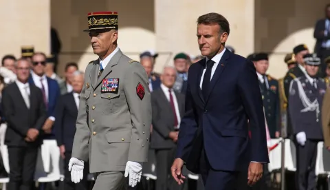epa12354110 French President Emmanuel Macron (R) and Chief of Staff of the French Armed Forces Thierry Burkhard arrive at a farewell ceremony for Burkhard, in the courtyard of the Invalides, in Paris, France, 05 September 2025. EPA/CHRISTOPHE ENA/POOL MAXPPP OUT