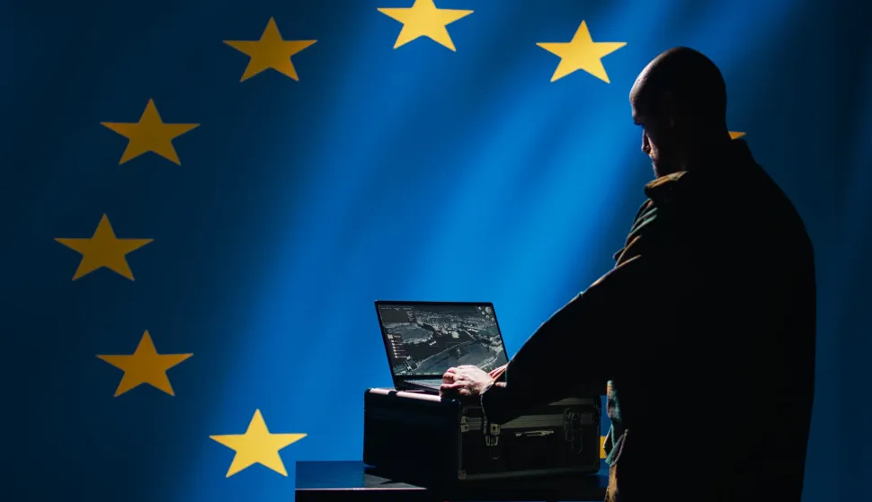 European Union alliance soldier in control room uses military tech to identify threats. EU intelligence agency operator uses software to relay info to front lines, protecting member states, camera B