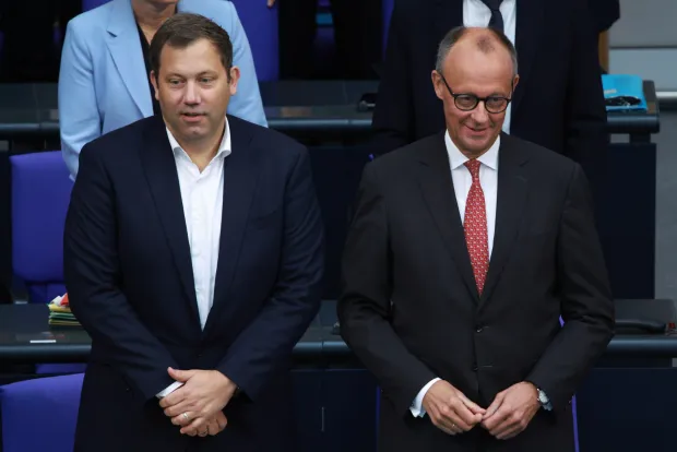 epa12384261 German Finance Minister Lars Klingbeil (L) and German Chancellor Friedrich Merz look on during a session of the German Parlaiment 'Bundestag' in Berlin, Germany, 17 September 2025. Members of the German Parliament discussed among other topics, the budget of the German Chancellory and the chancellor. EPA/CLEMENS BILAN