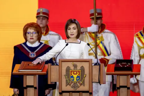 epa11792018 Moldovan President Maia Sandu takes the oath on the Moldova's Constitution during her inauguration ceremony at the Republican Palace in Chisinau, Moldova, 24 December 2024. Sandu took the oath of office for a second term after winning the runoff of the presidential elections held in Moldova on 03 November. EPA/DUMITRU DORU