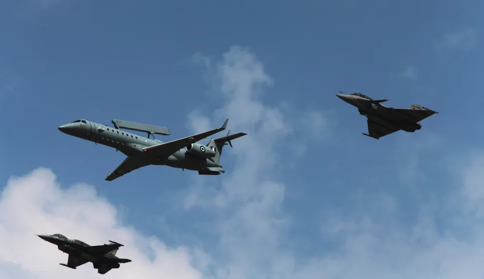 epa12355247 A French Rafale fighter jet (R), an Awacs (C) and a F16 Hellenic airforce plane (L) perform during the Athens Flying Week 2025 International Air Show at Tanagra Air Base, Viotia, central Greece, 05 September 2025. Athens Flying Week, which is the biggest air show in the Balkans with over 500,000 loyal fans worldwide, will take place from 6 to 7 September. EPA/ALEXANDROS VLACHOS