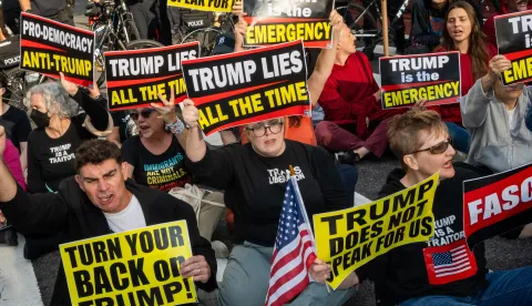 epa12399893 People sit down on the street at a shut down Trump protest outside of United Nations headquarters in New York, New York, USA, 23 September 2025. During the General Debate of the 80th session of the United Nations General Assembly (UNGA), Palestine has been recognised as a state by 157 UN member states. EPA/JOHN TAGGART