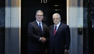 epa12362908 British Prime Minister Keir Starmer (L) greets the President of the Palestinian Authority, Mahmoud Abbas (R) outside 10 Downing Street in London, Britain, 08 September 2025. EPA/TOLGA AKMEN