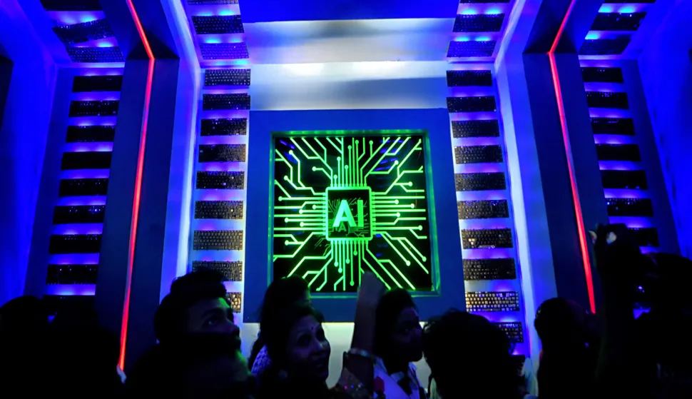 Visitors are seen inside of a Pandal (Temporary place for Worship) decorated with Artificial intelligence (AI) concept Theme during the Durga puja festival. Durga Puja also known as Durgotsava or Sharodotsav, is an annual festival originating in the Indian subcontinent which reveres and pays homage to the Hindu goddess Durga and is also celebrated because of Durga's victory over Mahishasura. (Photo by Avishek Das/SOPA Images/Sipa USA) Photo: SOPA Images/SIPA USA