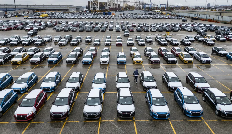 epa12016592 An image taken with a drone shows new Mitsubishi automobiles awaiting transport from the Dundalk Marine Terminal in Baltimore, Maryland, USA, 07 April 2025. In an attempt to bolster US auto production, the Trump administration has placed a 25 percent tariff on imported cars and car parts. EPA/JIM LO SCALZO