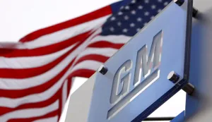 epa07191282 (FILE) - Flags flying outside the General Motors (GM) World Headquarters in the Renaissance Center in Detroit, Michigan, USA, 19 November 2008 (reissued 26 November 2018). Reports on 26 November 2018 state General Motors is to cut its North American workforce by some 14,700 staff. The assembly plants that will face closure are Oshawa Assembly in Oshawa, Ontario, Canada, Detroit-Hamtramck Assembly in Detroit and Lordstown Assembly in Warren, Ohio, while propulsion plants that will be unallocated in 2019 include Baltimore Operations in White Marsh, Maryland and Warren Transmission Operations in Warren, Michigan. GM expects the actions to increase annual adjusted automotive free cash flow by 6 billion USD by year-end 2020 on a run-rate basis. EPA/JEFF KOWALSKY *** Local Caption *** 51455812