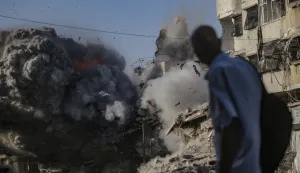 epa12428094 Smoke rises at the Al Harazin building following an air strike during an Israeli military operation in Gaza City, Gaza Strip, 03 October 2025. More than 66,000 Palestinians have been killed in the Gaza Strip since October 2023, according to the Palestinian Ministry of Health, and about 1,200 Israelis have been killed since the launch of an Israeli military campaign in response to a cross-border attack by Hamas on 07 October 2023. EPA/MOHAMMED SABER